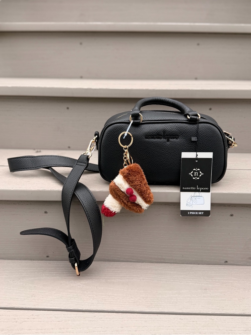 Nanette Lepore Black Crossbody Bag with Brown & Cream Charm